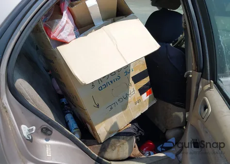 2002 Toyota Corolla Le z USA, uszkodzony, nr VIN 2T1BR12EX2C577933